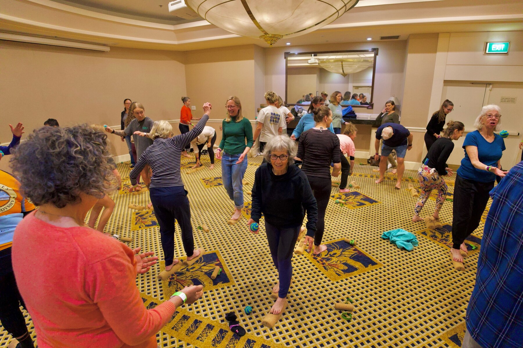 Participants practising foot and balance exercises in a workshop, photo by The Foot Collective